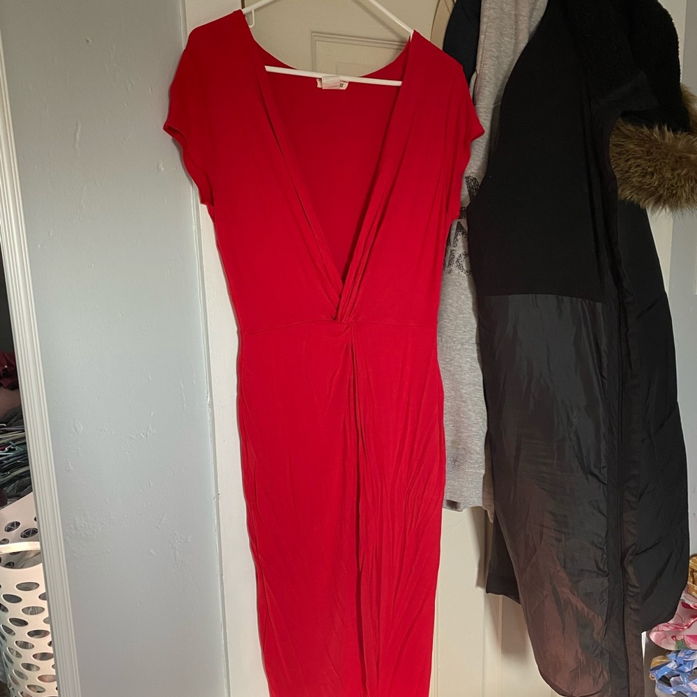 Long maxi dress with low cut neck and leg slit